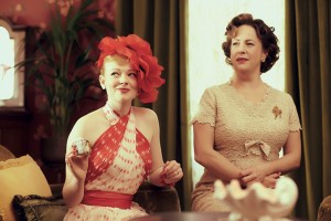 Gertrude-in-the-red-and-cream-polka-dot-dress-in-The-Dressmaker